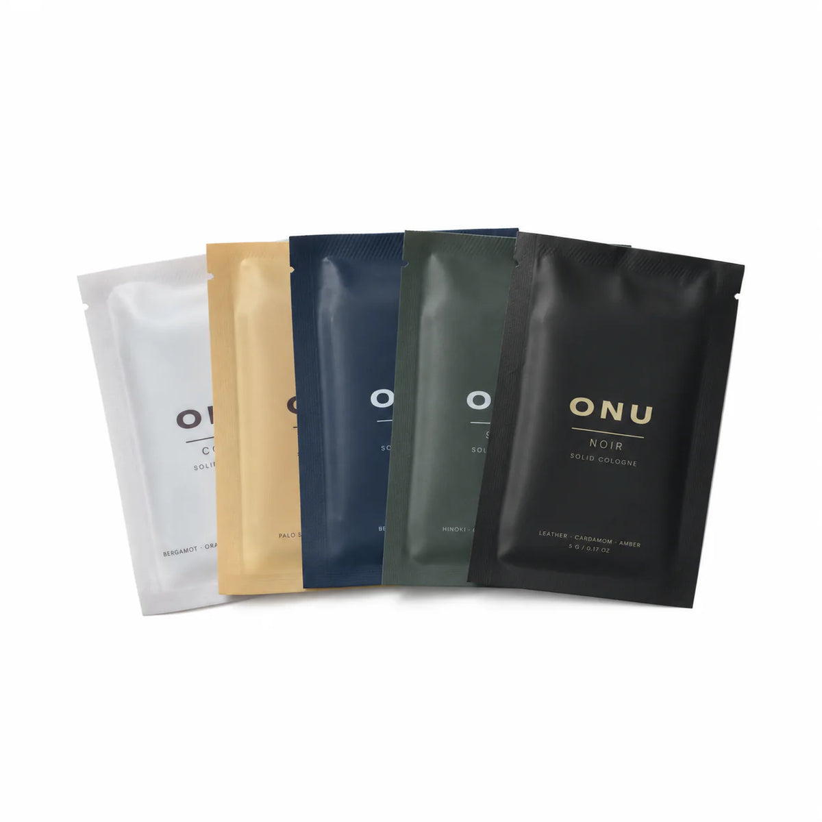 Five ONU solid balm cologne sachets arranged in a compact fan on a white background.